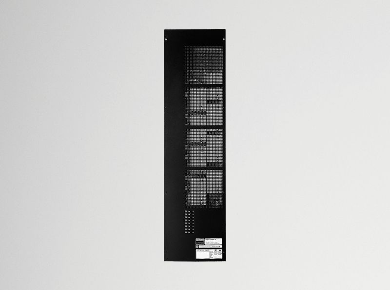 Tall, narrow, black Lutron dimming panel with multiple modules and ventilation slots.